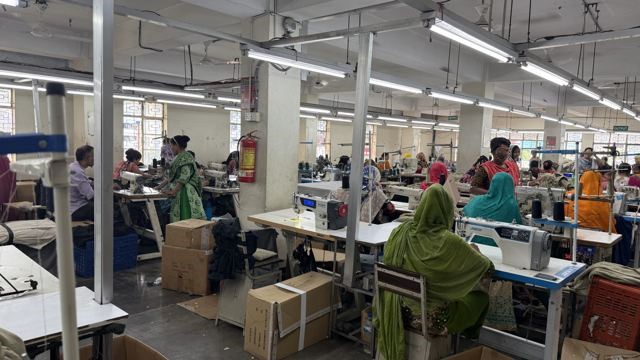 A wide view across one of our five sewing lines in production.